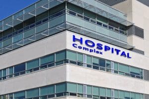 A hospital complex building with the words " hospitals complex ".