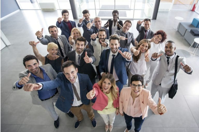 A group of people standing in front of each other.