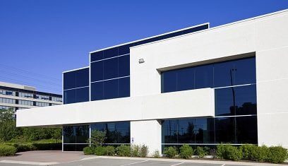 A large building with many windows on the outside.