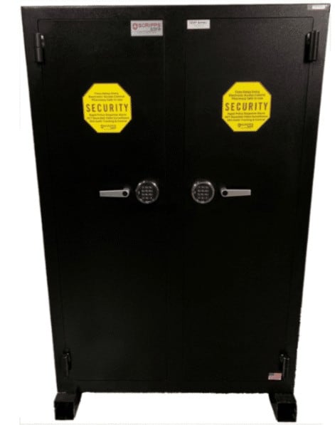 A black cabinet with two yellow signs on it.