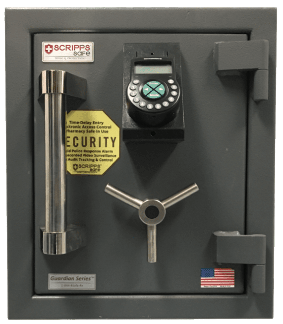 A combination lock safe with a phone and key.