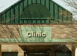 A building that says clinic in front of it.